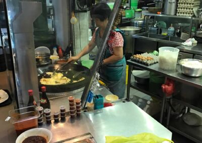 Woman preparing omelet