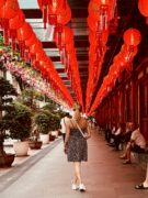 Girl in Singapore under lanterns