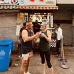 Mumbai in Contrast Part 2: Bollywood Dreams, Slum Reality, Bike Rides, and Street Food 33 Couple toasting with Chai, Mumbai