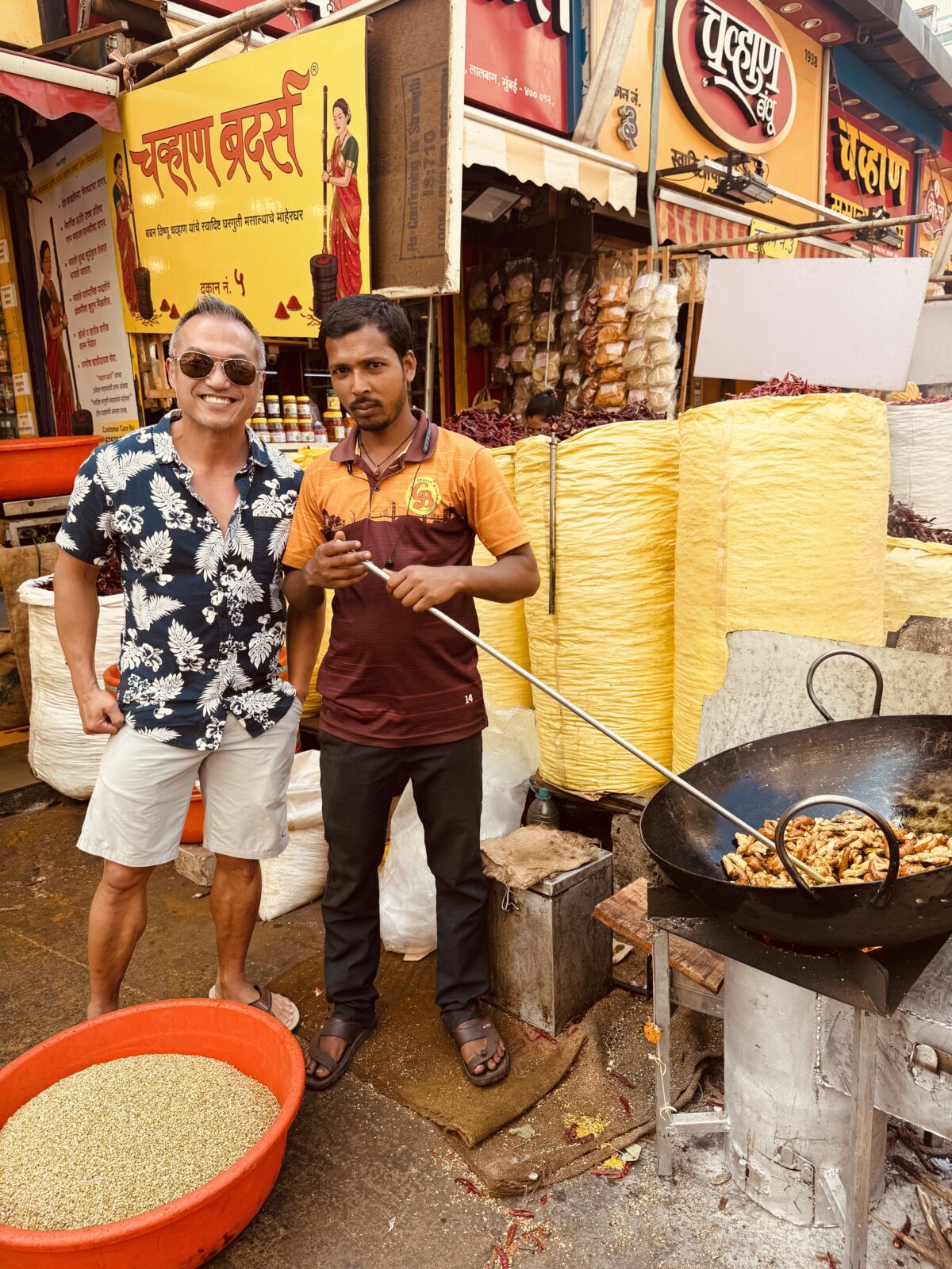 IMG_3752 two men at spice market stirring spices