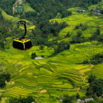 Sapa Travel Guide: Rice Terraces, Mountain Villages & Is It Worth the Trip? 48 Fansipan cable car aerial view terraced rice fields Sa Pa Viet Nam